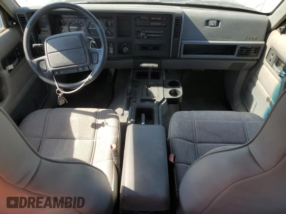 1996 Jeep Cherokee Sport with VIN 1J4FJ68S3TL257912, listed as a Copart auction lot 77109634 with 53,841 mi miles and Clean Title. Bid and sale history available at carsss.com. Image 8.