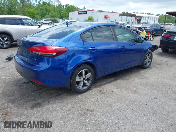 2018 Kia Forte LX with VIN 3KPFL4A77JE281839, listed as a IAAI auction lot 42012006 with 134,675 mi miles and . Bid and sale history available at DreamBid. Image 4.