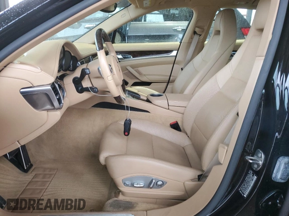 2015 Porsche Panamera S E-Hybrid z VIN WP0AD2A7XFL040092, wystawiony jako Copart lot #85878734 z przebiegiem 89 354 mil mil oraz Tytuł czysty. Historia ofert i sprzedaży dostępna na DreamBid. Obrazek 7.