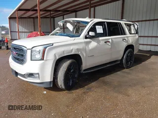 2015 GMC Yukon SLT with VIN 1GKS2BKC6FR612606, listed as a IAAI auction lot 41096580 with Not Provided miles and . Bid and sale history available at DreamBid. Image 2.