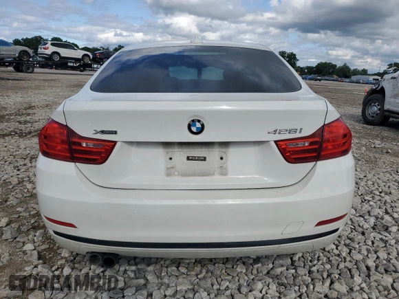 2015 BMW 4 Series 428i xDrive with VIN WBA4A7C53FD415066, listed as a Copart auction lot 61880545 with 130,874 mi miles and Salvage title. Bid and sale history available at DreamBid. Image 6.