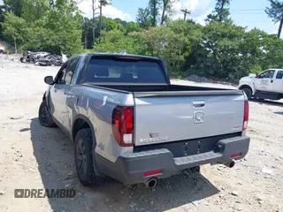 2021 Honda Ridgeline Sport with VIN 5FPYK3F10MB021413, listed as a IAAI auction lot 39847416 with 28,044 mi miles and . Bid and sale history available at DreamBid. Image 3.