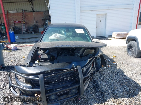 2021 Dodge Charger Police with VIN 2C3CDXAT2MH551264, listed as a IAAI auction lot 42210195 with 58,268 mi miles and . Bid and sale history available at DreamBid. Image 13.