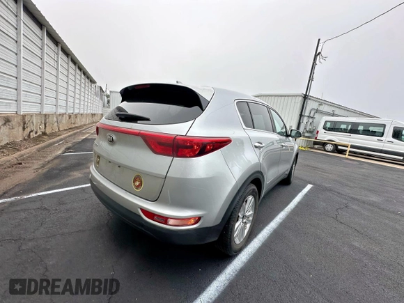 2019 Kia Sportage LX with VIN KNDPM3AC1K7513099, listed as a Copart auction lot 55706075 with 194,886 mi miles and Clean Title. Bid and sale history available at carsss.com. Image 4.