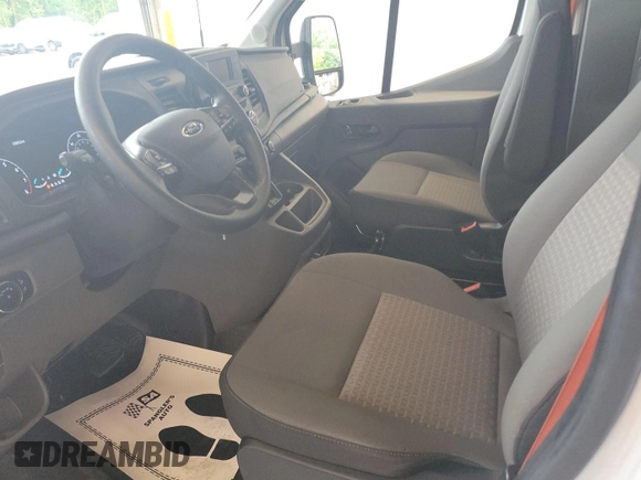 2023 Ford Transit Cargo с VIN 1FTBR1X89PKA75830, выставлен на аукционе IAAI как лот 42907933 с пробегом 17 668 миль миль и . История ставок и продаж доступна на DreamBid. Изображение 14.