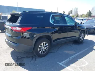 2021 Chevrolet Traverse LT Cloth with VIN 1GNERGKW9MJ162089, listed as a IAAI auction lot 41944248 with 99,586 mi miles. Bid and sale history available at carsss.com. Image 4.
