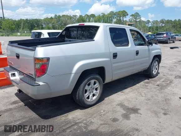 2008 Honda Ridgeline RT with VIN 2HJYK16228H524622, listed as a IAAI auction lot 42445595 with 209,649 mi miles and . Bid and sale history available at DreamBid. Image 4.