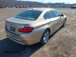 2013 BMW 5 Series 528i with VIN WBAXG5C52DDY33728, listed as a IAAI auction lot 41713841 with 105,963 mi miles and . Bid and sale history available at carsss.com. Image 4.