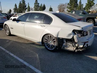 2015 BMW 7 Series 740Li with VIN WBAYE4C51FD947047, listed as a Copart auction lot 86773284 with 90,714 mi miles and Salvage Title. Bid and sale history available at DreamBid. Image 2.