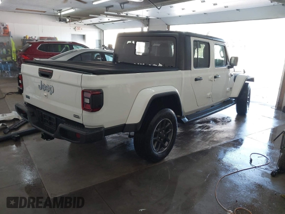 2020 Jeep Gladiator Overland with VIN 1C6HJTFG7LL139896, listed as a IAAI auction lot 41347570 with 98,484 mi miles and . Bid and sale history available at DreamBid. Image 4.