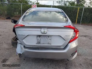 2019 Honda Civic Sedan LX with VIN 2HGFC2F62KH583213, listed as a IAAI auction lot 41935570 with 143,992 mi miles. Bid and sale history available at carsss.com. Image 17.
