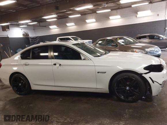 2014 BMW 5 Series 528i xDrive with VIN WBA5A7C57ED612230, listed as a IAAI auction lot 41586318 with 148,676 mi miles and . Bid and sale history available at DreamBid. Image 13.