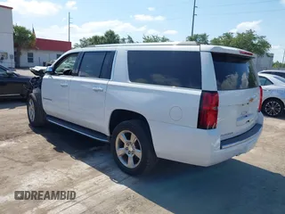 2020 Chevrolet Suburban Premier with VIN 1GNSCJKC9LR125292, listed as a IAAI auction lot 42073858 with 92,363 mi miles and . Bid and sale history available at DreamBid. Image 3.