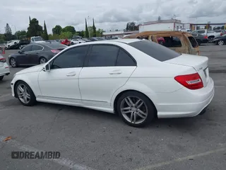 2014 Mercedes-Benz C-Class C 250 Sport with VIN WDDGF4HB9EA945465, listed as a IAAI auction lot 42035693 with 146,809 mi miles. Bid and sale history available at carsss.com. Image 14.