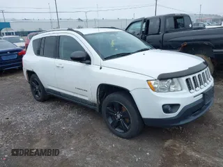 2011 Jeep Compass Latitude with VIN 1J4NF1FB7BD278368, listed as a IAAI auction lot 41993671 with 106,386 mi miles. Bid and sale history available at carsss.com. Image 1.