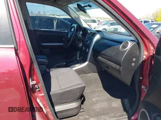 2008 Suzuki Grand Vitara w/Spare & Cargo Covers z VIN JS3TD941084101215, wystawiony jako IAAI lot #42154547 z przebiegiem 141 851 mil mil oraz . Historia ofert i sprzedaży dostępna na DreamBid. Obrazek 5.