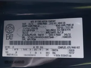 2013 Ford Escape SEL with VIN 1FMCU9H95DUB57946, listed as a IAAI auction lot 41416862 with 91,791 mi miles. Bid and sale history available at carsss.com. Image 9.