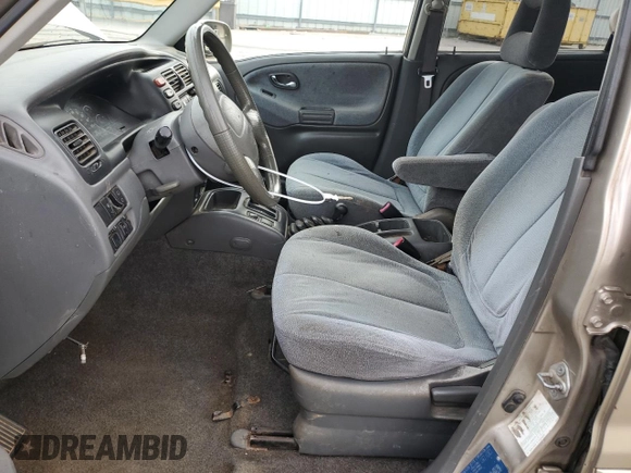 2002 Suzuki XL7 Standard z VIN JS3TX92V424130897, wystawiony jako Copart lot #84635434 z przebiegiem 208 447 mil mil oraz Szkoda całkowita • Salvage title. Historia ofert i sprzedaży dostępna na DreamBid. Obrazek 7.