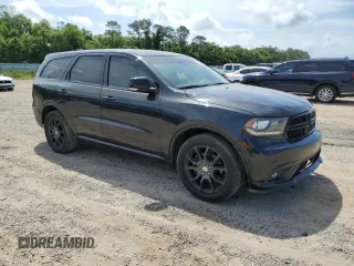 2016 Dodge Durango R/T with VIN 1C4SDHCT9GC415957, listed as a Copart auction lot 53565115 with 144,412 mi miles and Salvage title. Bid and sale history available at DreamBid. Image 4.