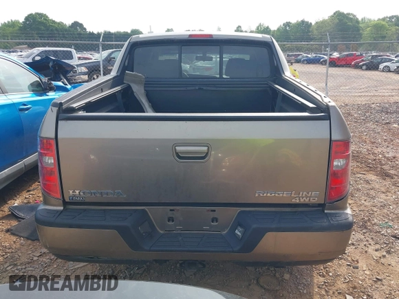 2010 Honda Ridgeline RTL with VIN 5FPYK1F50AB003576, listed as a IAAI auction lot 42050763 with 183,197 mi miles. Bid and sale history available at carsss.com. Image 16.
