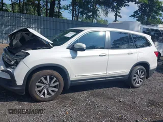 2021 Honda Pilot EX with VIN 5FNYF6H38MB072297, listed as a IAAI auction lot 42561276 with 119,172 mi miles and . Bid and sale history available at DreamBid. Image 14.
