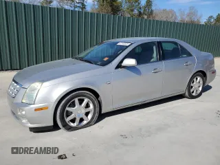 2005 Cadillac STS with VIN 1G6DW677950196102, listed as a Copart auction lot 42146505 with 323,458 mi miles and Salvage Title. Bid and sale history available at DreamBid. Image 1.