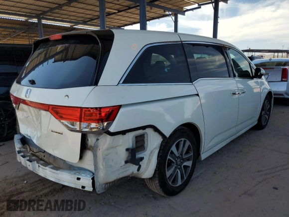 2014 Honda Odyssey Touring с VIN 5FNRL5H94EB110797, выставлен на аукционе Copart как лот 60702365 с пробегом 106 131 миль миль и Списание • Salvage title. История ставок и продаж доступна на DreamBid. Изображение 3.