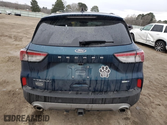 2020 Ford Escape Titanium z VIN 1FMCU9J91LUA73891, wystawiony jako Copart lot #89178475 z przebiegiem 35 579 mil mil oraz Szkoda całkowita • Salvage title. Historia ofert i sprzedaży dostępna na DreamBid. Obrazek 6.