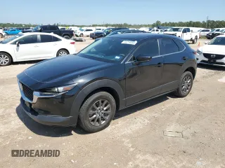 2021 Mazda CX-30 S with VIN 3MVDMAAL9MM219898, listed as a Copart auction lot 50219365 with 52,704 mi miles and Clean title. Bid and sale history available at DreamBid. Image 1.