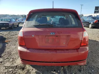 2005 Kia Spectra with VIN KNAFE161455146328, listed as a Copart auction lot 77605534 with 110,605 mi miles and Salvage Title. Bid and sale history available at carsss.com. Image 6.