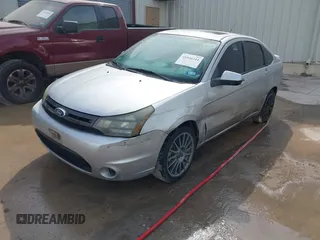 2011 Ford Focus SES with VIN 1FAHP3GN2BW196398, listed as a IAAI auction lot 41940344 with 116,482 mi miles. Bid and sale history available at carsss.com. Image 2.