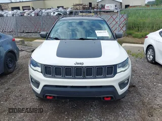 2019 Jeep Compass Trailhawk z VIN 3C4NJDDB3KT760631, wystawiony jako IAAI lot #42681139 z przebiegiem 71 128 mil mil oraz . Historia ofert i sprzedaży dostępna na DreamBid. Obrazek 12.