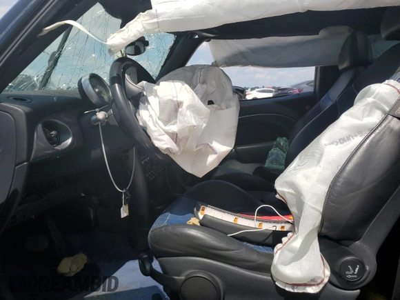 2006 MINI Hardtop with VIN WMWRC33566TK15023, listed as a Copart auction lot 76392014 with Not provided miles and Salvage title. Bid and sale history available at DreamBid. Image 7.