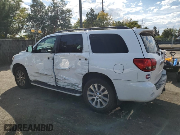 2014 Toyota Sequoia Limited with VIN 5TDJW5G12ES094076, listed as a Copart auction lot 73304924 with 224,852 mi miles and Salvage Title. Bid and sale history available at carsss.com. Image 2.