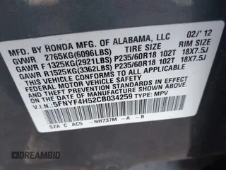 2012 Honda Pilot EX-L with VIN 5FNYF4H52CB034259, listed as a IAAI auction lot 41871625 with 159,577 mi miles and . Bid and sale history available at carsss.com. Image 9.