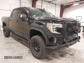 2020 GMC Sierra 1500 Denali with VIN 1GTU9FEL8LZ176453, listed as a IAAI auction lot 42194497 with 64,932 mi miles and . Bid and sale history available at DreamBid. Image 1.