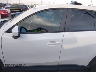 2014 Mazda CX-5 Touring with VIN JM3KE2CY8E0321578, listed as a IAAI auction lot 41769930 with 101,724 mi miles. Bid and sale history available at carsss.com. Image 14.