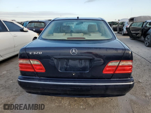 2000 Mercedes-Benz E-Class with VIN WDBJF65J7YB047628, listed as a Copart auction lot 75278704 with 0 mi miles and Salvage Title. Bid and sale history available at carsss.com. Image 6.