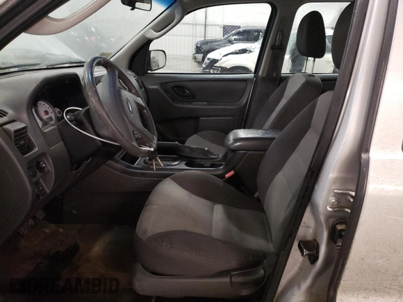 2007 Ford Escape XLS with VIN 1FMCU92Z77KA84801, listed as a Copart auction lot 82052144 with 180,774 mi miles and Salvage title. Bid and sale history available at DreamBid. Image 7.