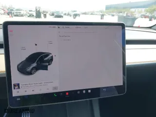 2021 Tesla Model Y Performance with VIN 5YJYGDEF7MF273897, listed as a IAAI auction lot 41925881 with 29,345 mi miles. Bid and sale history available at carsss.com. Image 16.