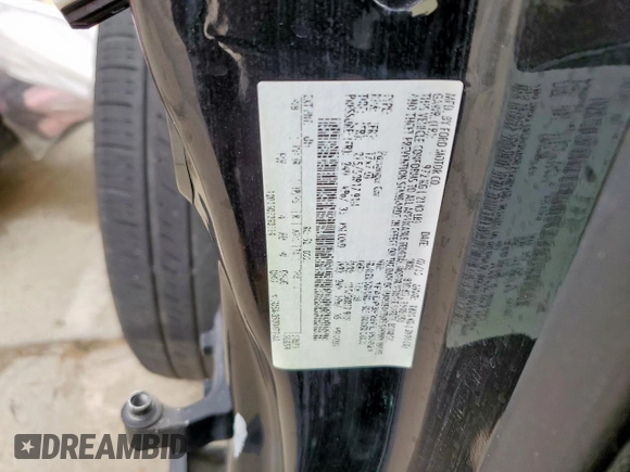 2015 Ford Focus SE z VIN 1FADP3F29FL357021, wystawiony jako Copart lot #57985125 z przebiegiem 142 786 mil mil oraz Szkoda całkowita • Salvage title. Historia ofert i sprzedaży dostępna na DreamBid. Obrazek 13.
