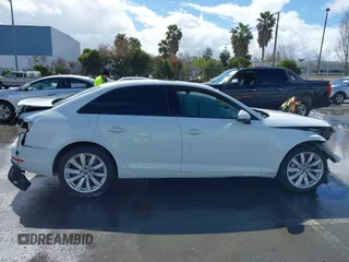 2017 Audi A4 Premium with VIN WAUANAF40HN011047, listed as a IAAI auction lot 41824638 with 107,802 mi miles. Bid and sale history available at carsss.com. Image 12.