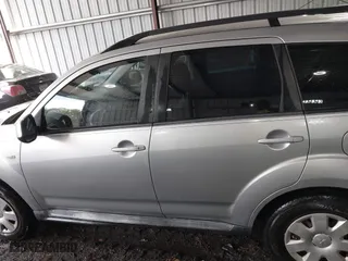 2011 Mitsubishi Outlander ES with VIN JA4AS2AW4BU025549, listed as a IAAI auction lot 41837460 with 98,647 mi miles. Bid and sale history available at carsss.com. Image 14.