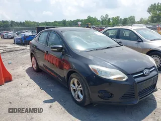 2013 Ford Focus SE z VIN 1FADP3F23DL334444, wystawiony jako IAAI lot #42686359 z przebiegiem 73 934 mil mil oraz . Historia ofert i sprzedaży dostępna na DreamBid. Obrazek 1.