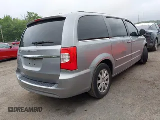 2014 Chrysler Town & Country Touring with VIN 2C4RC1BG5ER280297, listed as a IAAI auction lot 42189192 with 123,864 mi miles. Bid and sale history available at carsss.com. Image 4.