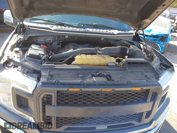 2018 Ford F-150 XL with VIN 1FTEW1EG2JKC51138, listed as a IAAI auction lot 41593411 with 149,324 mi miles. Bid and sale history available at carsss.com. Image 10.