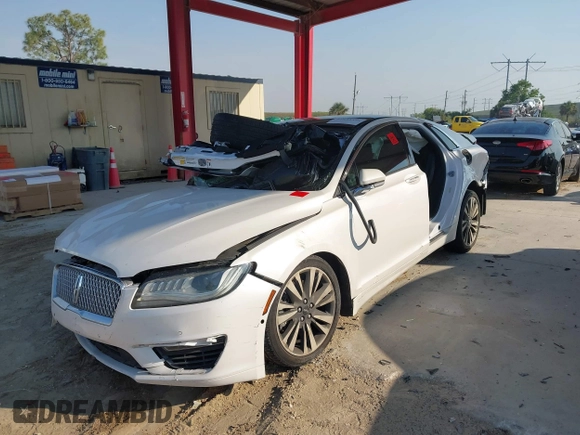 2017 Lincoln MKZ Reserve with VIN 3LN6L5EC1HR613057, listed as a IAAI auction lot 41633326 with 124,909 mi miles and . Bid and sale history available at DreamBid. Image 2.