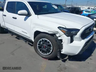 2024 Toyota Tacoma 4WD SR5 with VIN 3TMLB5JN1RM050446, listed as a IAAI auction lot 41658922 with 9,369 mi miles. Bid and sale history available at carsss.com. Image 6.