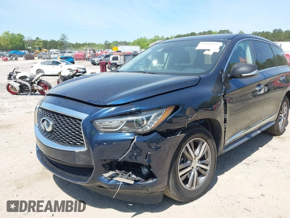 2020 Infiniti QX60 Luxe with VIN 5N1DL0MM6LC528615, listed as a IAAI auction lot 42016614 with 81,449 mi miles and . Bid and sale history available at DreamBid. Image 6.