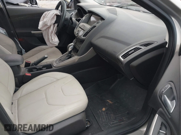 2016 Ford Focus Titanium with VIN 1FADP3N21GL346002, listed as a IAAI auction lot 39229347 with 114,683 mi miles and . Bid and sale history available at DreamBid. Image 5.